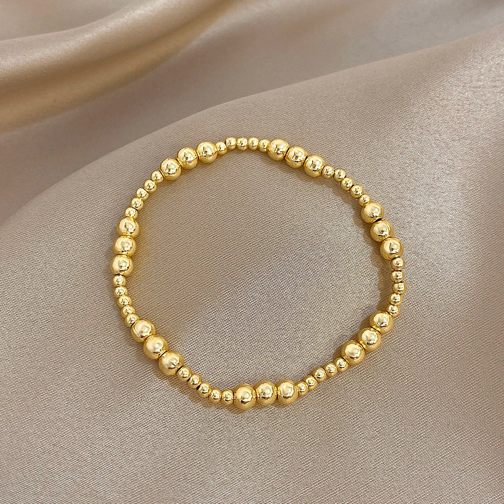 Pulsera de cuentas de acero inoxidable Greatera – Pulsera de cadena elástica tricolor bañada en oro de 3/4 mm para mujer | Regalo de joyería de moda impermeable