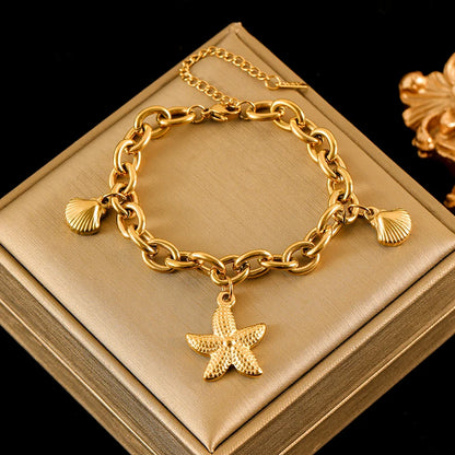 Pulsera de acero inoxidable 316L con dijes de estrellas de mar, luna y estrellas doradas – Cadena de muñeca moderna para mujer, regalo de joyería para fiestas