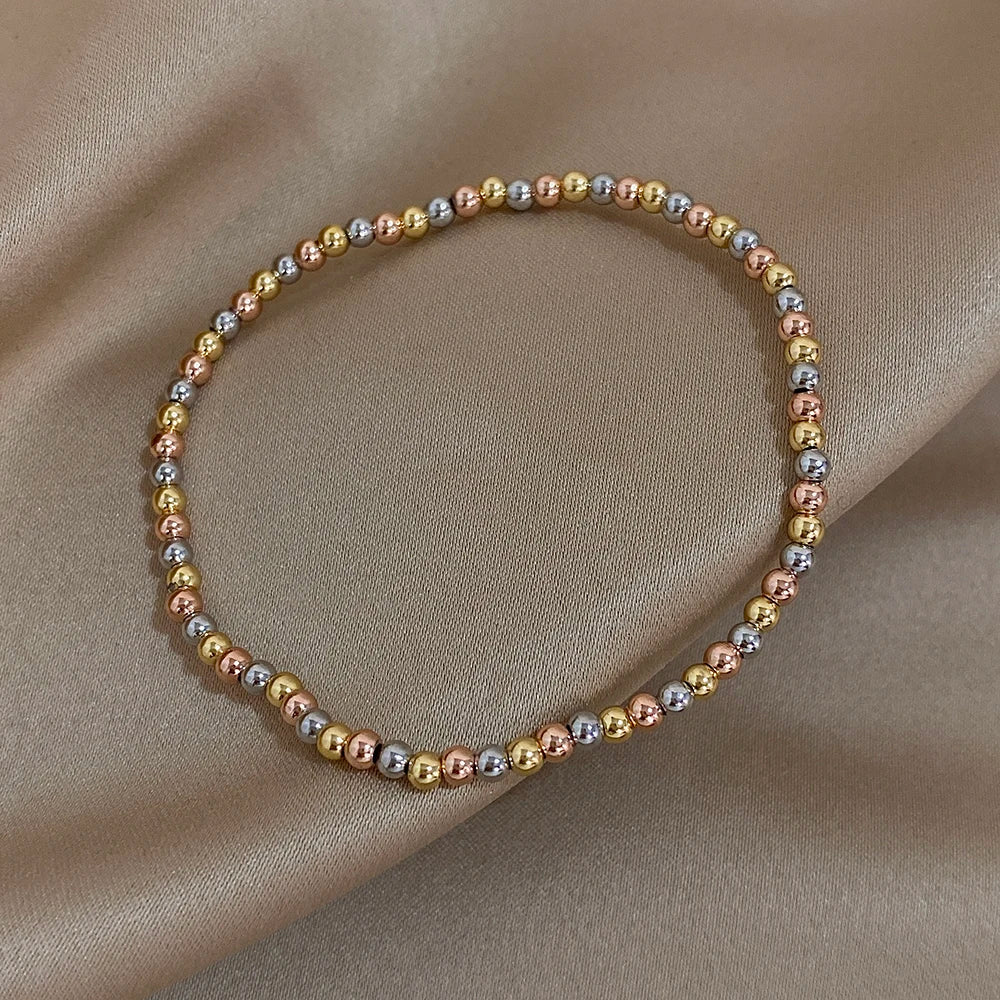 Pulsera de cuentas de acero inoxidable Greatera – Pulsera de cadena elástica tricolor bañada en oro de 3/4 mm para mujer | Regalo de joyería de moda impermeable