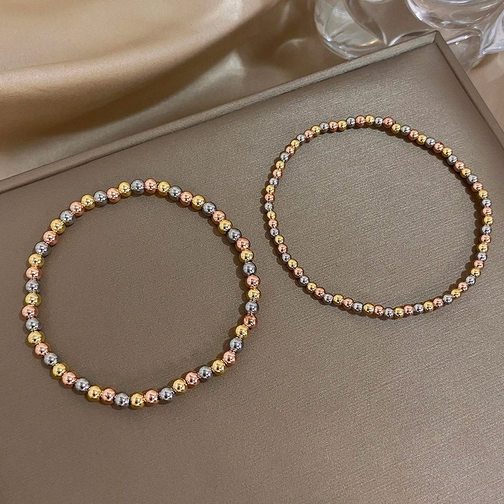 Pulsera de cuentas de acero inoxidable Greatera – Pulsera de cadena elástica tricolor bañada en oro de 3/4 mm para mujer | Regalo de joyería de moda impermeable