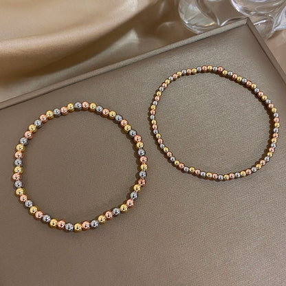 Pulsera de cuentas de acero inoxidable Greatera – Pulsera de cadena elástica tricolor bañada en oro de 3/4 mm para mujer | Regalo de joyería de moda impermeable