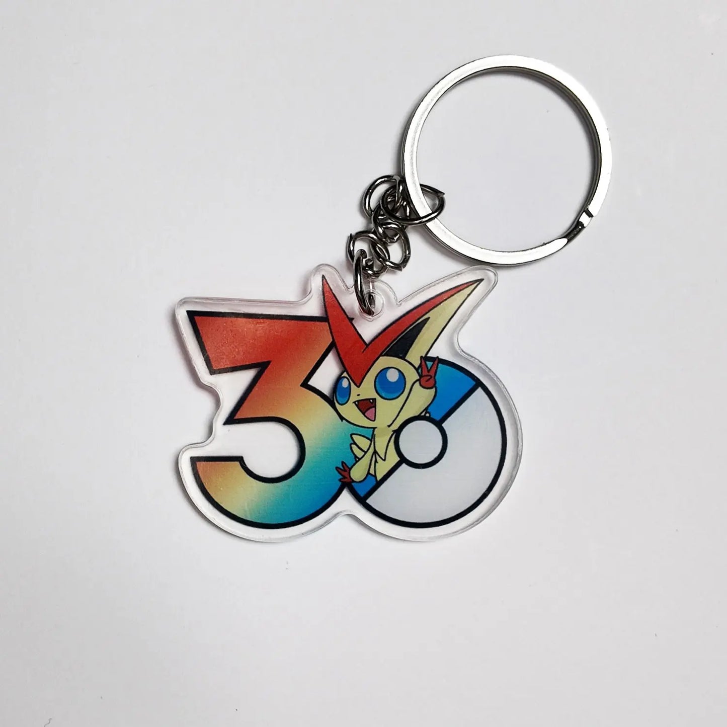 Pokémon 30th Anniversary Acrylic Keychain – Captain Pikachu, Eevee & Eeveelutions (50 Styles)