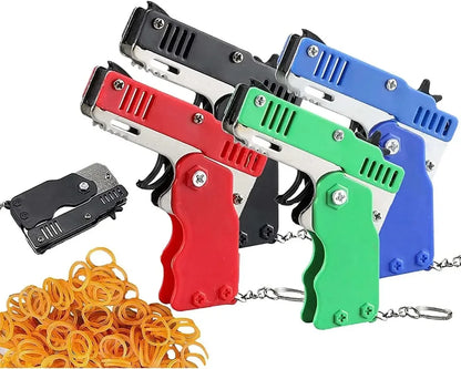 Llavero de pistola de goma de metal - Mini pistola de juguete de aleación con 60 gomas elásticas para juegos al aire libre, diversión en fiestas y regalos