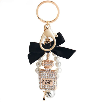 Imitation Pearl Perfume Bottle Keychain – Cute Bow Car Key Ring & Fashion Bag Charm Accessory for Women and Girls