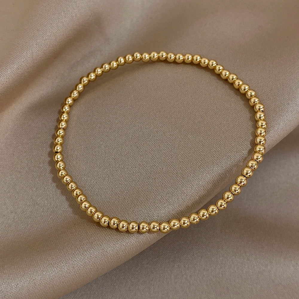 Pulsera de cuentas de acero inoxidable Greatera – Pulsera de cadena elástica tricolor bañada en oro de 3/4 mm para mujer | Regalo de joyería de moda impermeable