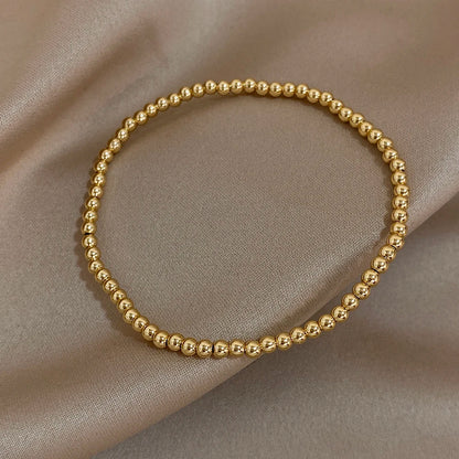 Pulsera de cuentas de acero inoxidable Greatera – Pulsera de cadena elástica tricolor bañada en oro de 3/4 mm para mujer | Regalo de joyería de moda impermeable