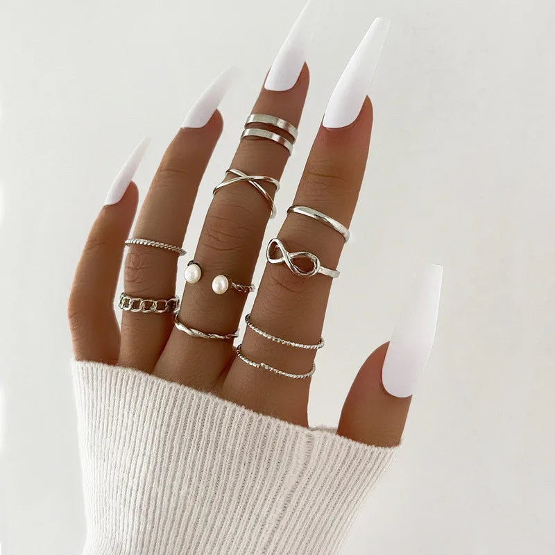 Conjunto de anillos apilables de circonita cúbica plateada para mujer – Luna, flecha, flor y corazón | Joyería de moda para boda y regalo