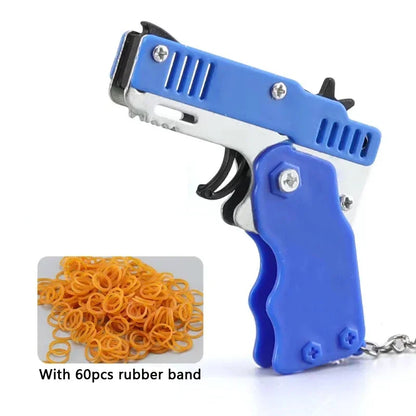 Llavero de pistola de goma de metal - Mini pistola de juguete de aleación con 60 gomas elásticas para juegos al aire libre, diversión en fiestas y regalos