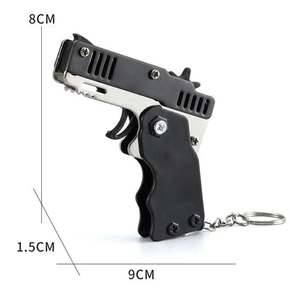 Llavero de pistola de goma de metal - Mini pistola de juguete de aleación con 60 gomas elásticas para juegos al aire libre, diversión en fiestas y regalos