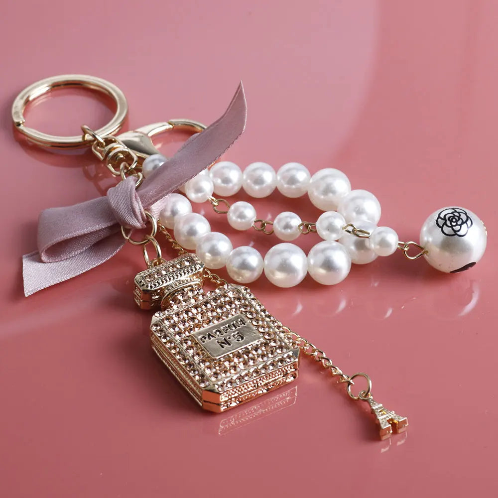 Imitation Pearl Perfume Bottle Keychain – Cute Bow Car Key Ring & Fashion Bag Charm Accessory for Women and Girls