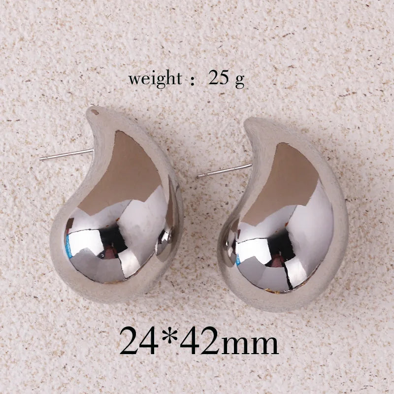 Pendientes de gota de agua gruesos en color dorado de moda 2024 – Pendientes colgantes de lágrima brillantes para mujer, accesorios de joyería de moda llamativos, pendientes de estilo personal y regalo
