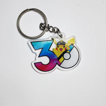 Pokémon 30th Anniversary Acrylic Keychain – Captain Pikachu, Eevee & Eeveelutions (50 Styles)
